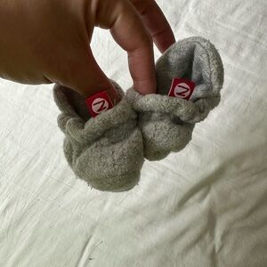 Soft gray baby slippers